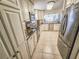 Charming kitchen with granite countertops, stainless steel appliances, and stylish tiled backsplash at 6060 Shore S Blvd # 200, Gulfport, FL 33707