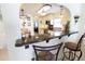 Bright, renovated kitchen featuring granite countertops and bar seating at 6060 Shore S Blvd # 200, Gulfport, FL 33707
