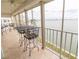 Relax on the lanai with tile flooring and a view of the ocean at 6060 Shore S Blvd # 200, Gulfport, FL 33707