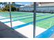 Multiple shuffleboard courts with shaded seating areas at 6060 Shore S Blvd # 200, Gulfport, FL 33707