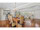 Elegant dining room with decorative chandelier and seamless transition to living area and kitchen at 636 16Th Ne Ave, St Petersburg, FL 33704