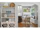 Dining room with bench seating, wine fridge and modern decor at 636 16Th Ne Ave, St Petersburg, FL 33704
