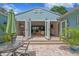 Rear exterior elevation view with french doors leading to the covered patio at 636 16Th Ne Ave, St Petersburg, FL 33704