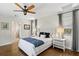 Comfortable main bedroom with hardwood floors, ensuite bathroom, and stylish decor at 636 16Th Ne Ave, St Petersburg, FL 33704