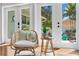 Relaxing sitting area with a tropical plant motif, offering a view to the home's exterior at 636 16Th Ne Ave, St Petersburg, FL 33704