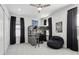 Spacious bedroom with a unique lofted bed, comfortable furniture, and plenty of natural light at 714 S Lois Ave, Tampa, FL 33609
