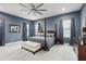 Serene main bedroom with luxurious bedding, soft lighting, and elegant decor at 714 S Lois Ave, Tampa, FL 33609