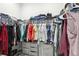 Spacious walk-in closet featuring shelving and storage solutions for optimal organization at 714 S Lois Ave, Tampa, FL 33609