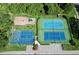 A fenced community playground and tennis courts provide residents fun recreational activities at 9308 Fairway Lakes Ct, Tampa, FL 33647