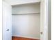 Spacious closet with white trim and ample storage space for an organized wardrobe at 9308 Fairway Lakes Ct, Tampa, FL 33647