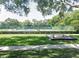 A community offers well-maintained tennis courts surrounded by beautiful landscaping for sport enthusiasts at 9308 Fairway Lakes Ct, Tampa, FL 33647