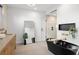 Modern bathroom featuring a standalone black bathtub, glass shower, and dual vanity sinks at 98 W Davis Blvd, Tampa, FL 33606