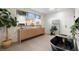 A luxurious bathroom features a black soaking tub, a marble tile wall, and dual sinks at 98 W Davis Blvd, Tampa, FL 33606