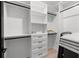 Walk-in closet with custom shelves, drawers and ample storage at 98 W Davis Blvd, Tampa, FL 33606