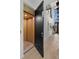 Modern home elevator featuring light wood paneling inside and hardwood flooring at 98 W Davis Blvd, Tampa, FL 33606