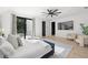 Spacious main bedroom with modern furnishings and a private balcony at 98 W Davis Blvd, Tampa, FL 33606