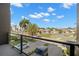 Stunning view from the balcony overlooking palm trees and the neighborhood at 98 W Davis Blvd, Tampa, FL 33606