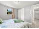 Bright bedroom with natural light, spacious closet and neutral walls at 1019 Goshen Rd, Tarpon Springs, FL 34689