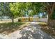 Inviting single-story home with a driveway and large trees in the front yard at 1019 Goshen Rd, Tarpon Springs, FL 34689