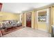 Cozy living room with natural light, comfortable seating, and stylish decor at 1019 Goshen Rd, Tarpon Springs, FL 34689