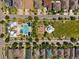 Aerial view of community park showing a playground, pool, and common area at 11907 Streambed Dr, Riverview, FL 33579