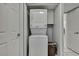 Convenient stacked washer and dryer in utility closet at 12155 Environmental Dr # 3, New Port Richey, FL 34654