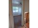 View into a bedroom with a ceiling fan and unfinished walls at 125 80Th N Ave, St Petersburg, FL 33702