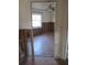 Bedroom renovation shows unfinished walls and ceiling fan at 125 80Th N Ave, St Petersburg, FL 33702