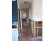 Hallway between rooms showing the subfloor and wall framing at 125 80Th N Ave, St Petersburg, FL 33702