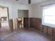 Home renovations shows unfinished rooms with open walls and floors at 125 80Th N Ave, St Petersburg, FL 33702