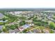 This scenic aerial view highlights the home's desirable location within a well-maintained community and its proximity to local amenities at 12508 Evington Point Dr, Riverview, FL 33579