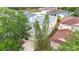 Aerial view of a house and community with lush landscaping and well-maintained properties at 12508 Evington Point Dr, Riverview, FL 33579