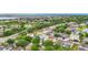 Community aerial view featuring ponds, trees, and well-maintained homes at 12508 Evington Point Dr, Riverview, FL 33579