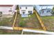 Aerial view of a fully fenced backyard and houses in a well-maintained neighborhood at 12508 Evington Point Dr, Riverview, FL 33579
