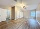 Large bedroom featuring vaulted ceiling, laminate flooring, and multiple closets for ample storage at 12508 Evington Point Dr, Riverview, FL 33579
