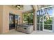 Screened-in hot tub on the lanai with tropical landscaping at 12523 Riverglen Dr, Riverview, FL 33569
