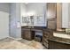 The main bathroom features a vanity with double sinks and abundant storage at 12523 Riverglen Dr, Riverview, FL 33569