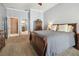 Comfortable main bedroom features carpet, ceiling fan, and access to the main bathroom at 12523 Riverglen Dr, Riverview, FL 33569