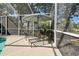 Inviting screened-in pool featuring outdoor lounge chairs, ideal for relaxation and summer fun at 12523 Riverglen Dr, Riverview, FL 33569