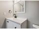 Bathroom featuring white vanity, matte black faucet and hardware at 130 Sabal Ct # C, Oldsmar, FL 34677