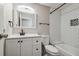 Updated bathroom featuring subway tile in shower, white vanity, and decorative tile floor at 130 Sabal Ct # C, Oldsmar, FL 34677