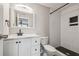 Remodeled bathroom featuring stylish tile flooring, a new vanity, and a white subway tile shower at 130 Sabal Ct # C, Oldsmar, FL 34677