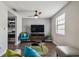 Comfortable living room features modern decor and an open floor plan with wood floors and stylish furniture at 130 Sabal Ct # C, Oldsmar, FL 34677