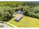 Aerial view of the lakeside open-air picnic shelter, perfect for outdoor gatherings and enjoying the beautiful scenery at 130 Sabal Ct # C, Oldsmar, FL 34677