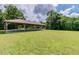 Community picnic pavilion situated in a green area at 130 Sabal Ct # C, Oldsmar, FL 34677