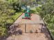 Playground featuring swings and slides in a well-maintained community area at 130 Sabal Ct # C, Oldsmar, FL 34677