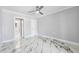 Large bedroom offering plenty of natural light, recessed lighting, and contemporary ceiling fan at 139 Wall St, Redington Shores, FL 33708
