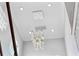 Elegant crystal chandelier illuminating the staircase at 139 Wall St, Redington Shores, FL 33708