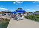 Waterfront dock featuring outdoor furniture and a boat lift on the canal at 139 Wall St, Redington Shores, FL 33708