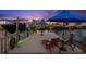 Private boat dock with lift, seating area, and peaceful water views at 139 Wall St, Redington Shores, FL 33708